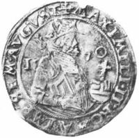 Een halve rijksdaalder uit 1570. Zoals Gerard Munnicks van Cleeff deze tot 1860 in zijn muntenkabinet had. De afgebeelde 1/2 rijksdaalder uit 1570 is een voorbeeld gevonden op internet (1).