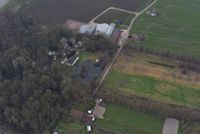 Luchtfoto uit 2016 vanuit het oosten gezien met links in de bossen landgoed en huize Wickenburgh en de Wickenburghseweg. Foto: Slagboom en Peeters Luchtfotografie B.V.