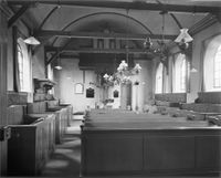 Kerkinterieur naar het oosten gezien van de N.H. kerk te Schalkwijk (Brink 10) in februari 1960. Bron: Rijksdienst voor het Cultureel Erfgoed (RCE) te Amersfoort, documentnummer: 55.864.