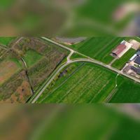 Luchtfoto gezien vanuit het zuiden met de bocht in de Blasenburgseweg en de Waalseweg in 2019. Foto: Slagboom en Peeters Luchtfotografie B.V..