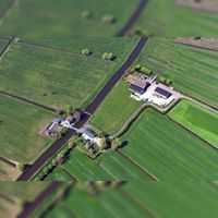 Luchtfoto gezien vanuit het zuidoosten op het boerderijencomplex aan de Knoesterweg nr. 1 en de Schalkwijksewetering nr. 1, aan de Schalkwijksewetering in 2019. Foto: Slagboom en Peeters Luchtfotografie B.V..